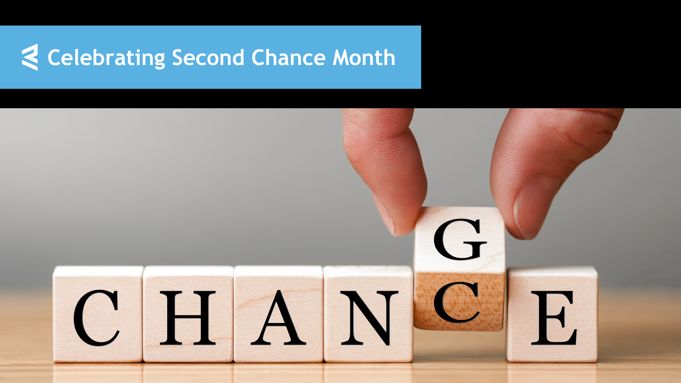 Celebrating Second Chance Month. Wooden blocks spelling out the word change with the g lifted up and the c underneath the g in change.